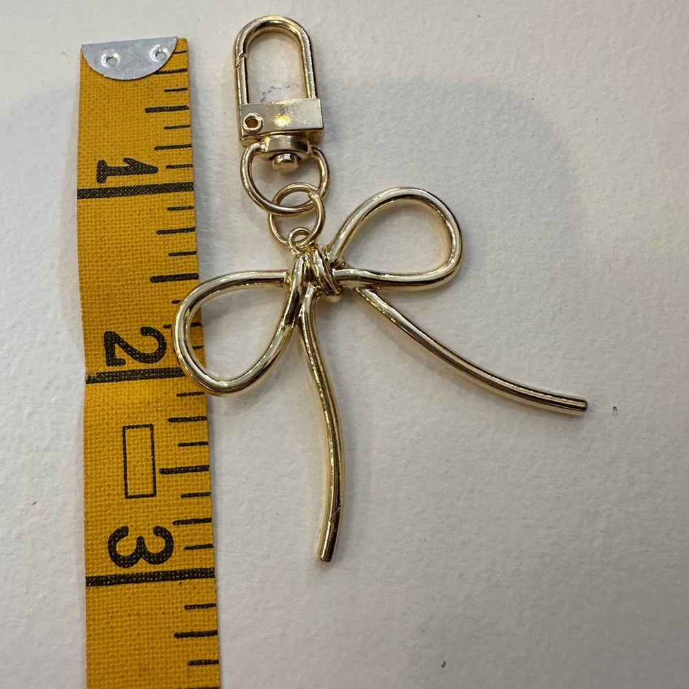Elegant Gold Bow Bag Charm - Picture 3 of 3